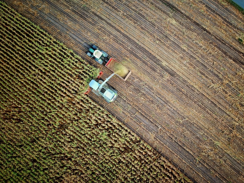 Aerial view of a combine harvester in a field