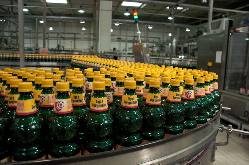 Bottles moving along a food and beverage production line