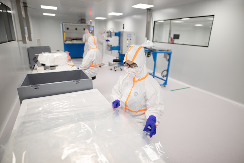 Technicians in a medical device cleanroom